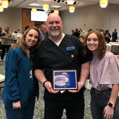 Dr. Weber of Gainesville, GA receiving Dentist of the year award